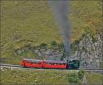 <U>Bahnbildergipfeltreffen in Brienz.</U>  

Hier wird mit Kohle geheizt. In der Steigung vor dem Dirrengrind ist Nr. 6 unterwegs zum Gipfel. September 2013.
