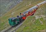 <U>Bahnbildergipfeltreffen in Brienz.</U>  

Das Gegenstück zu http://www.bahnbilder.de/bild/bahnbilder-treffen~treffen-2013~2013-09-27-28-29-brienz-und-brb/728331/-bahnbildergipfeltreffen-in-brienz-8211-die.html 
Lok 14 bringt den duellierenden Fotografen und ihrem Sekundanten einen Vorsprung ein. September 2013. 
 