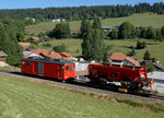 CJ: Gem 4/4 401 mit einem Schotterzug bei Tramelan am 18.