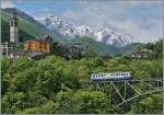 Der FART ABDe 6/6 N° 32 als Regionalzug 311 Camedo - Locarno kurz nach dem Halt in Intragna.
(Neu bearbeitet)
22.Mai 2013 