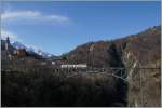 Nocheinmal die 132 Meter lange Isorno-Brücke mit dem FART Regionalzug 309 von Camedo nach Locarno und einem Blick ins Isorno Tal.