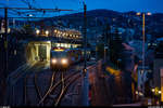 Ein FLP Mandarinli Be 4/12 verlässt am Abend des 11. Dezember 2019 den Bahnhof Lugano FLP in Richtung Ponte Tresa.