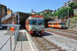 Be 4/12 21 und Be 4/12 23 im Endbahnhof der FLP in Ponte Tresa, 04.08.2013.