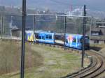 Der Be 4/8 Werbetriebwagen der BD fhrt in Richtung Bremgarten Bahnhof.