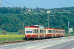 WB Regionalzug 26 von Liestal nach Waldenburg am 09.05.1993 bei Bad Bubendorf mit Triebwagen BDe 4/4 13 - Bt 118 - Bt 120.
