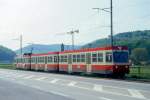 WB Regionalzug 29 von Waldenburg nach Liestal am 09.05.1993 bei Bad Bubendorf mit Steuerwagen voraus Bt 120 - Bt 118 - Triebwagen BDe 4/4 13.
