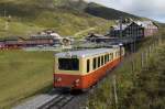 Am 13.8.11 verlsst ein Zug der JB, bestehend aus dem Bt 30 und dem BDhe 2/4 206, die Kleine Scheidegg Richtung Jungfraujoch.