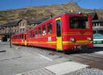 Zug Nr. 202 bestehend aus Bt 26 und BDhe 2/4 202 bei Ausfahrt in Kleine Scheidegg in Richtung Jungfraujoch, 10.11.2011.