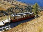 BDhe 2/4 Triebwagen 203 der JB (Jungfraubahn) abgestellt am 02.10.2011 beim Bahnhof Kleine Scheidegg. Aufgenommen aus fahrenden Zug der WAB. Der Tiebwagen wurde 1960 von der SLM und BBC gebaut, die Antriebsleistung betrgt 440 kW und die Hchsgeschwindigkeit betrgt 24 km/h (bergwrts) und 12 km/h (talwrts).