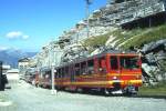 JB - Regionalzug 547a von Kleine Scheidegg nach Jungfraujoch am 03.08.1994 Ausfahrt Eigerglescher mit Zahnrad-Doppeltriebwagen BDhe 4/8 212 - BDhe 4/8 214 - Hinweis: gescanntes Dia
