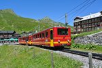 Abschiedsbilder der alten JB BDhe 2/4 im Planeinsatz: BDhe 2/4 Nr. 208 mit Bt 
32 bei Ausfahrt in Kleine Scheidegg, 19.07.2016.