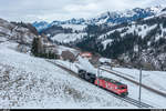 BC Winterdampffahrt Zweisimmen - Montreux am 4. März 2018 mit den HG 3/4 FO 4 und BFD 3.<br>
Die beiden HG 3/4 FO 4 und BFD 3 werden zwischen Montbovon und Chamby von der GDe 4/4 6005 gezogen, weil sie nicht für so steile Adhäsionsstrecken zugelassen sind. Bei Allières.