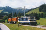 Montreux - Oberland bernois MOB.
Erinnerung an den Güterverkehr der alten MOB.
Kehrichtzug Saanen - Zweisimmen mit zwei Kehrichtwagen auf Rollböcken im August 1993. Diese Aufnahme mit der GDe 4/4 6004  Interlaken  ist bei Saanenmöser entstanden.
Foto: Walter Ruetsch
