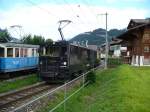 MOB - E - Lok  GDe 4/4 6002 bei der Ausfahrt aus dem Bahnhofsareal von Saanen am 29.07.2007