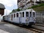 BC - Triebwagen BCFe 4/4 11 mit Personenwagen BC 22 unterwegs auf der MOB im Bahnhof Chamby am 16.05.2015