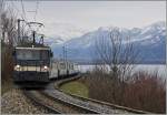 Kurz vor Planchamps ist die GDe 4/4 6004 (?) mit ihrem GoldenPass Classic 3126 von Montreux nach Zweisimmen unterwegs.
4. Feb. 2016