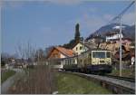 Die golden GDe 4/4  Schokoladenlok  führt bei Planchamp ihren Goldenpass Classic Zug 2212 von Zweisimmen Richtung Montreux.