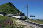 Der Rochers de Naye Beh 4/8 305 und ein weiterer sind auf dem Weg zum Rochers de Naye und passieren kurz nach dem Bahnhof von Jaman die Wasserscheide zwischen Rohne und Rhein.

1. Juli 2018