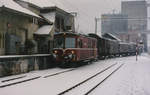 Regionalverkehr Bern Solothurn RBS
Güterzug mit De 4/4 103 bei der Einfahrt Lohn-Lüterkofen im Dezember 1996.
Foto: Walter Ruetsch