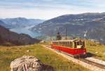 Talwrts fahrende Komposition der Schynige-Platte-Bahn direkt oberhalb der Mittelstation Breitlauenen am 08. Oktober 2006. Im Tal ist der Thunersee zu erkennen.