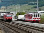 tpc - ( 100 Jahre AOMC ) Fahrzeugparade mit dem AOMC Triebwagen Be 4/4 103 und den Gterwagen Kkmp 682 und Kkm 672 und Gk-v 661 und Kkm 671 unterwegs bei Aigle und mit der SBB 460 011-7 die mit einem