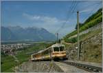 Der A-L Regionalzug 240 auf der Fahrt nach Leysin in der 230 Promille Rampe oberhalb von Aigle.