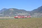 AOMC Bt 132 mit Be 4/4 101,  Yvorne  ex. BLT/BTB ABe 4/4 14, als Regio Aigle-Monthey-Ville bei Villy. Diese alten Pendel verkehren zurzeit noch im Talbetrieb. Der Zug fhrt einmal stndlich, hat jedoch eine Mittagspause von rund 3 Stunden, 18.03.2015.