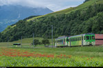 TPC/AOMC BDeh 4/4 501 und Bt 531 am 19. Juni 2016 bei Monthey unterwegs in Richtung Aigle. Entgegen kommt ein Bus der TPC von Aigle nach Villars.