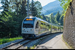 ABe 2/4 106 mit Werbung für die Gruyère Énergie SA führt am 7. Juli 2016 den Regionalzug nach Montbovon. Aufgenommen zwischen Broc Fabrique und Broc Village.