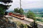 Frühling 2001 in der Nähe von Baulmes, Be4/4 3  Sainte-Croix  und Bt51 fahren Richtung Yverdon-les-Bains.