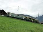 WAB TW 114 (Bdhe 4/4) mit Steuerwagen Bt, Grindelwald ausfahrend Richtung Kleine Scheidegg am 4.10.2013 
