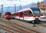 Die De 110 003-1 und die ABe 130 001-1 im Bf. Meiringen, am 14-10-2012