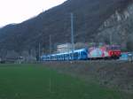 Re 456 142 mit ETR 360 001 im Schlepp bei Castione am 15.03.2013