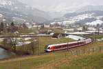 Als noch FLIRT der SOB nach Nesslau-Neu St. Johann fuhren (||) - Mit den im leichten Nebel liegenden Churfirsten im Hintergrund wurde kurz nach der Abfahrt im Bahnhof von Nesslau-Neu St. Johann S9 23961 auf der Fahrt nach Wil fotografiert (17.03.2012).
