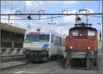 SOB BDt 194 neben Ee 3/3 16390 in Rapperswil. (18.03.2008)