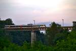 Auf der Thurbrücke aus dem Jahre 1857 überfährt die   S 33 im milden Abendlicht die Thur Richtung Winterthur.Bild vom 5.7.2015