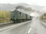 RhB Dampffestival Untervaz 2006.Dampftriebwagen CZm 1/2 mit 2 Wagen auf der Reinbrcke bei Untervaz.Hinten schiebt Lok E 3/3 No.6 der ehem.Papierfabrik Perlen.Ausserdem wurden heute die beiden RhB