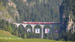 Schweiz: RhB Ge 4/4 III der Rhätischen Bahn auf dem Landwasserviadukt bei Filisur 29.08.2018