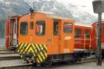 RhB - Tm 2/2 24 am 27.05.1990 in St.Moritz - Rangiertraktor - bernahme: 01.03.1965 - RACO1719/CUMMINS - 69 KW - Gewicht 9,00t - Zuladung 2,00t - LP 5,06m - zulssige Geschwindigkeit 4/8/17/30/60geschleppt km/h - 3=22.06.1989 - Logo nur RhB - Heimatstation: St.Moritz - Lebenslauf: ex Tm 2/2 60 - 22.06.1989 Tm 2/2 24 - 20.03.2007 Abbruch. Hinweis: gescanntes Dia
