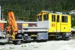 RhB - Tm 2/2 83 am 26.08.1998 in Preda - Bahndiensttraktor mit Kran und kippbarer Ladebrcke - bernahme: 11.03.1985 - RACO1903/Cummins - 336KW - Gewicht 22,00t - Ladegewicht 4,00t - LP 8,79m -