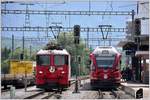 S1 1523 mit ABe 4/16 3105 neben Ge 4/4 II 618  Bergün/Bravuogn  in Untervaz-Trimmis. (18.05.2017)