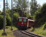 Ge 4/4 II 631  Untervaz  schiebt ihren R1848 (Filisur - Davos Platz) aus dem Bahnhof von Filisur.