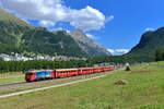 Ge 4/4 II 617 mit einem Regio am 20.08.2017 bei Pontresina. 