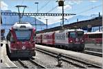 S1 1521 mit ABe 4/16 3104 nach Rhäzüns und RE1245 mit Ge 4/4 II 616  Filisur  nach Davos Platz in Landquart. (14.07.2018) 