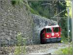 RE1252 mit Ge 4/4 II 630  Trun  verlsst den Dabi Tunnel zwischen Trin und Reichenau-Tamins.