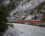 Ge 4/4 II 611  Landquart  am 8. August 2011 mit dem RE 1240 (Scuol-Tarasp - Diesentis/Muster) bei Trin.