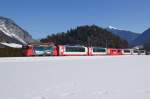 Ge 4/4 II 615 verlsst am 21.2.12 mit dem Glacier-Express 903 Domat/Ems in Richtung Reichenau-Tamins.