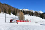 Ge 4/4 III 650 mit einem Regio am 13.01.2018 bei Davos Wolfgang. 