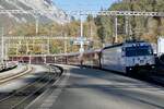 Ge 4/4 III 642  Breil/Brigels  Integral am 13.11.22 mit dem Alvra 5701 bei der Einfahrt in Reichenau-Tamins.