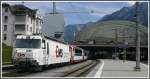 Ge 4/4 III 643  Vals  verlsst mit GEX 909/911 den Churer Bahnhof. (05.09.2010)